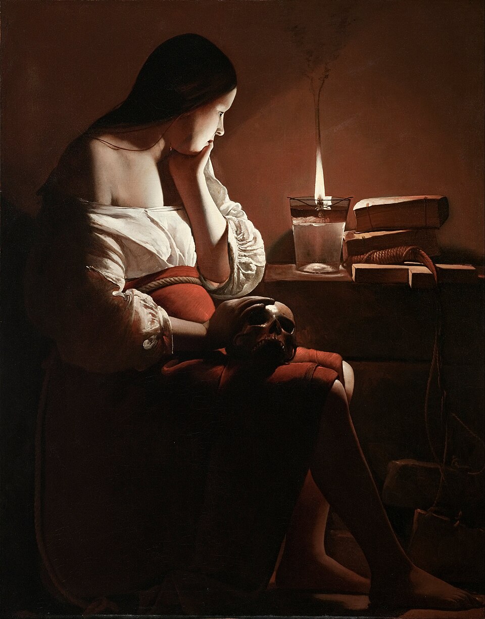 La Madeleine à la veilleuse de Georges de La Tour (vers 1640) : une femme songeuse contemple la flamme d'une lampe à huile dans la pénombre, image de la contemplation d'une flamme au cœur de la lampadomancie